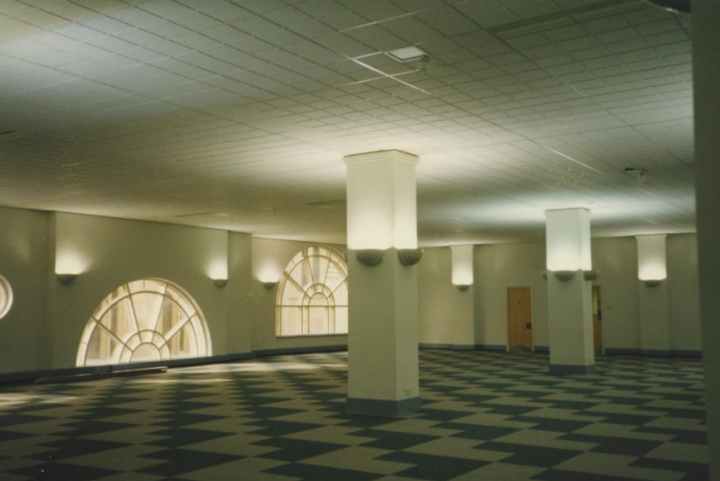 inside of building with flooring and lighting, but otherwise empty