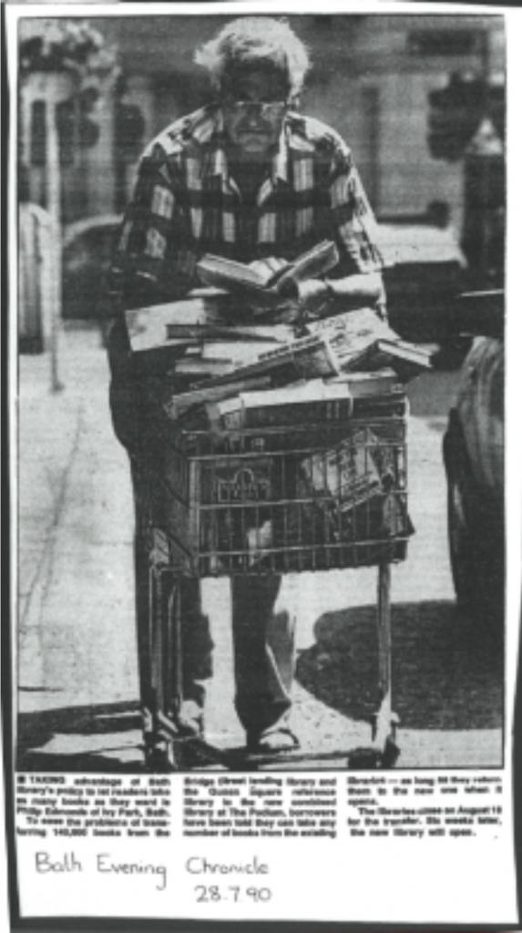 Newspaper Article showing picture of man pushing super market shopping trolley full of books. Transcript below.