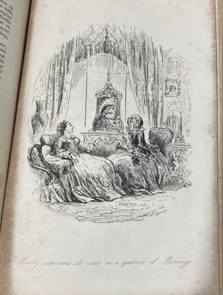 monochrome line drawing of two women in big dresses sitting near a bird cage