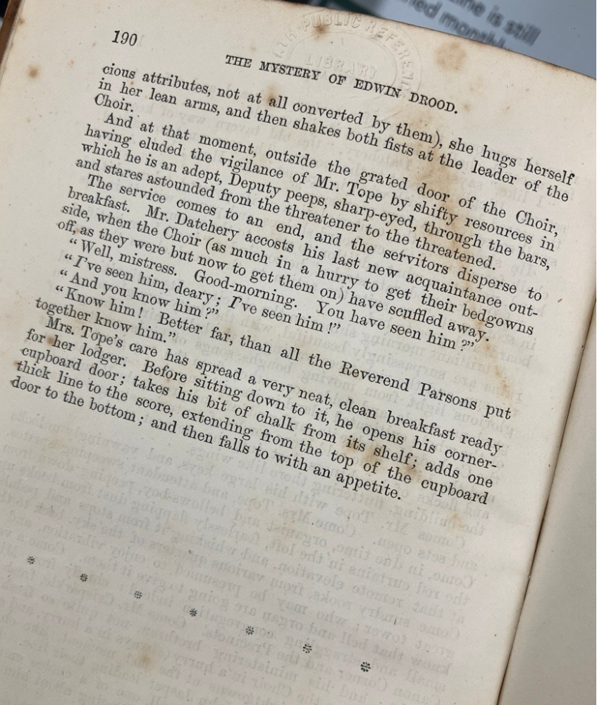 last page of The Mystery of Edwin Drood. a bit foxed and stained. the text finished half way down the page.