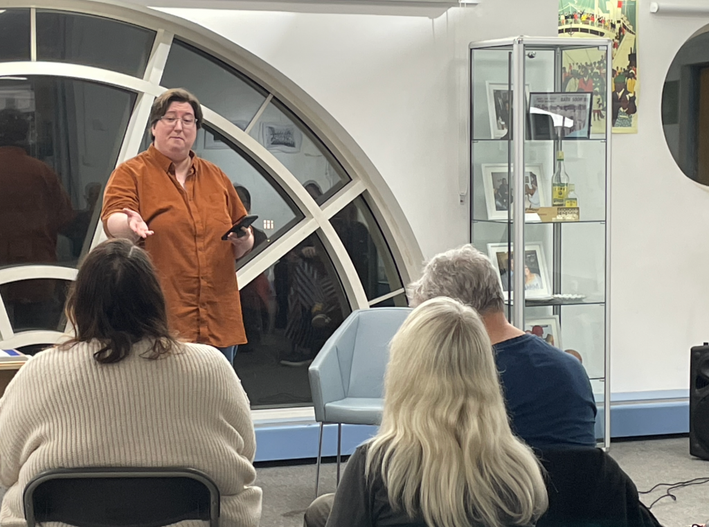 Woman stood in front of crowd